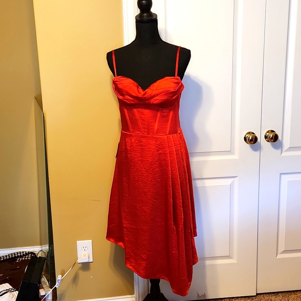 Hot red bustier dress with asymetric side drape. Size XL.  New With Tags.
